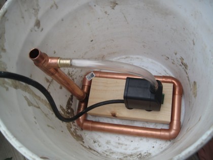 Fountain Pump with Copper base inside five-gallon bucket