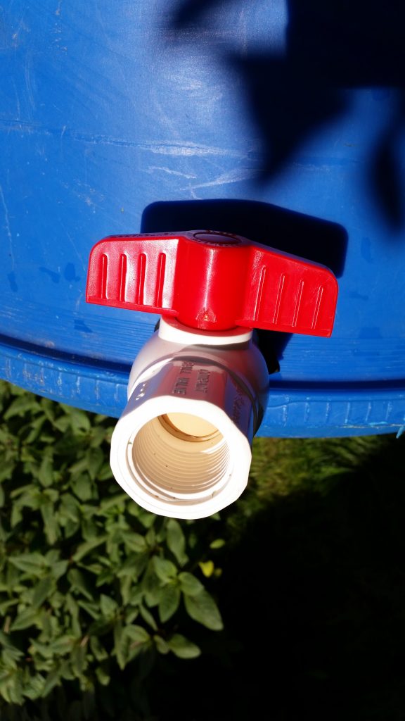 1 Inch PVC Valve Threaded Onto Slip to Threaded Male Insert, Forming A 1" Rain Barrel Spigot